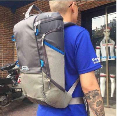 A person with a backpack Description automatically generated with low confidence